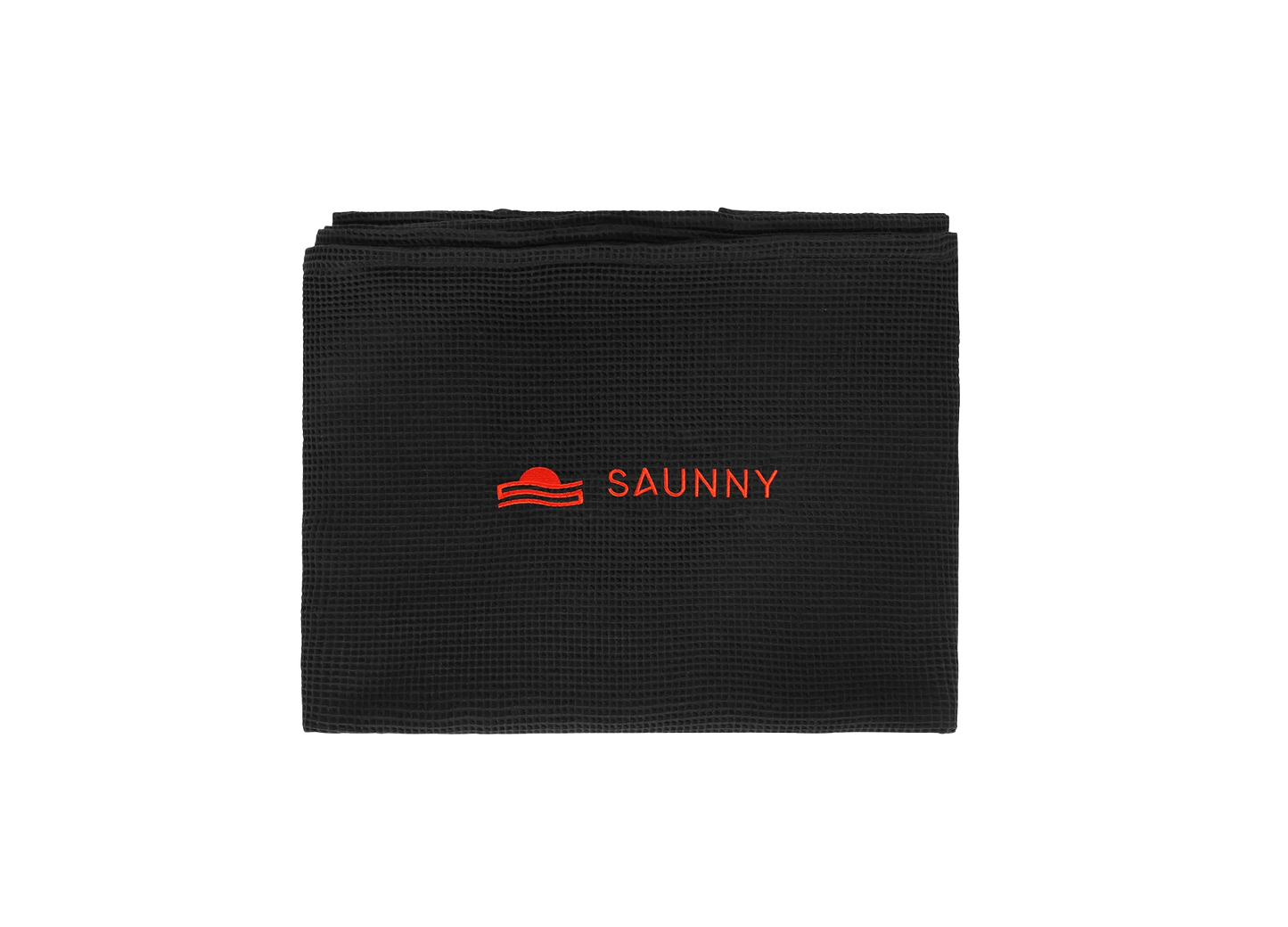 Folded SAUNNY blanket insert with visible logo, highlighting the breathable waffle weave texture.
