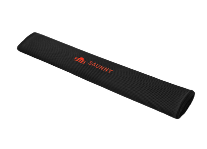 Rolled SAUNNY blanket insert in black waffle cotton texture, featuring the logo embroidered at the center.