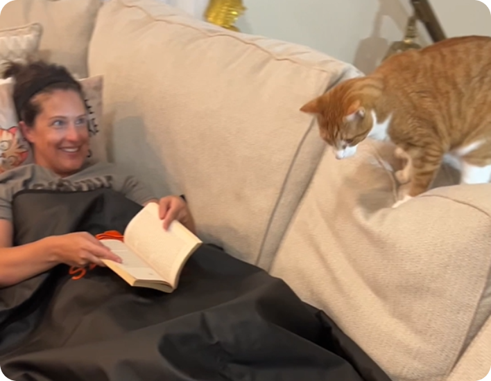 Interact with your cat during the infrared sauna blanket session